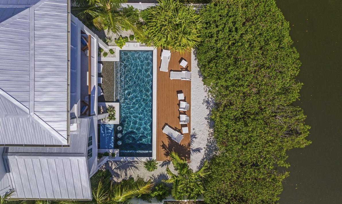 From Dusk 'til Dune, Gorgeous 5 Beds, 5,5 Baths On The Canal And Steps Away From The Beach!